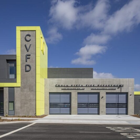 Chula Vista Fire Department building: grey stone building with bold yellow highlighting